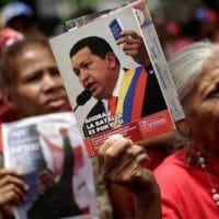 | Supporters of President Nicolas Maduro rally to support him while carrying pictures of late Venezuelas President Hugo Chavez in Caracas Venezuela May 8 2017 | MR Online