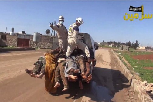 | White Helmets workers posing with the bodies of dead Syrian soldiers | MR Online