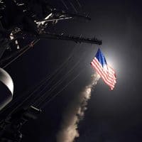 In this image provided by the U.S. Navy, the guided-missile destroyer USS Porter (DDG 78) launches a tomahawk land attack missile in the Mediterranean Sea, Friday, April 7, 2017. (Mass Communication Specialist 3rd Class Ford Williams/U.S. Navy via AP).
