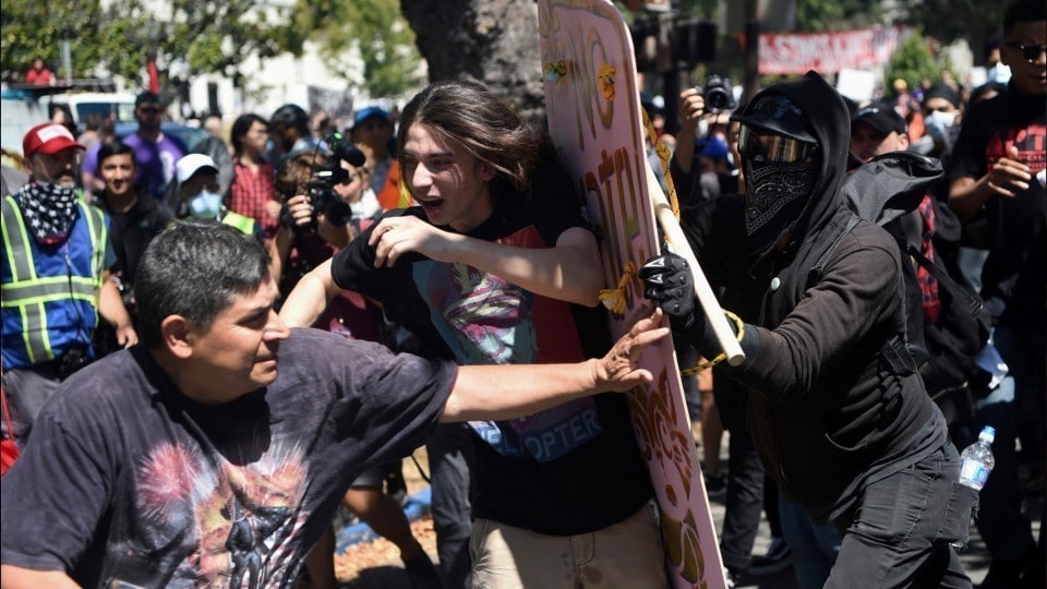| Anti fascists push back against a fascist protestor with a Pinochet T shirt | MR Online