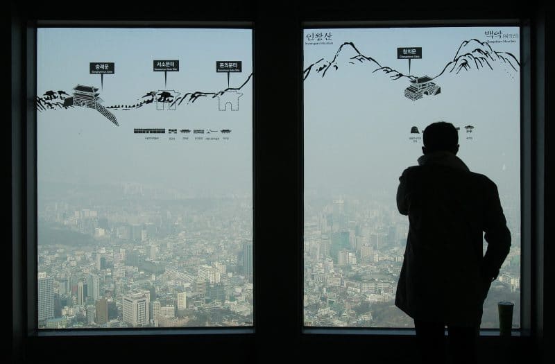 | Man at Seouls Tower | MR Online's.(AP/Ahn Young-joon)