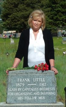 | Jane Botkin poses at Frank Little | MR Online's grave