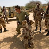 US Special Forces soldier trains Niger troops. (photo Credit: Reuters)