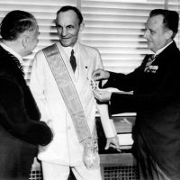 Ford receiving the Grand Cross of the German Eagle from Nazi officials, 1938