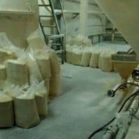 Bags of corn flour left to rot seen inside Demaseca's company plant in Venezuela. | Photo: Alba Movimientos
