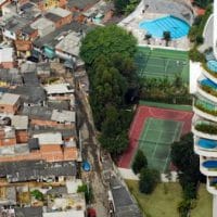 A shantytown in São Paulo, Brazil, borders the much more affluent Morumbi district. Credit: Tuca Vieira / Oxfam