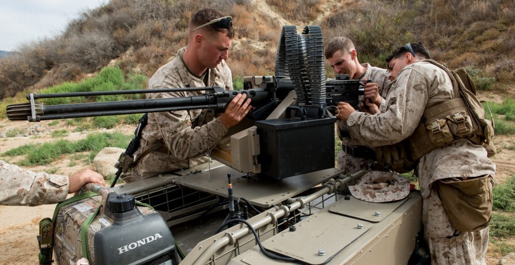 | US Marines adjust a mounted gun on the Multi Utility Tactical Transport MUTT for testing at Marine Corps Base Camp Pendleton Calif July 8 2016 US Marine Corps photo | MR Online