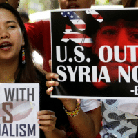 A demonstration against the US air raids on Syria in the Philippines. China's report states that the US has committed acts of aggression against Syria four times in recent months
