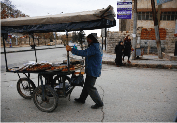 | Man pushing cart of food | MR Online