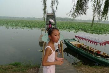 | Lotus lake and Chinese girl ecological paradise photo by Andre Vltchek | MR Online