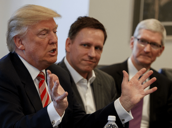 | Peter Thiel founder of CIA funded Palantir listens as Donald Trump speaks during a meeting with tech leaders at Trump Tower in New York Dec 14 2016 APEvan Vucci | MR Online