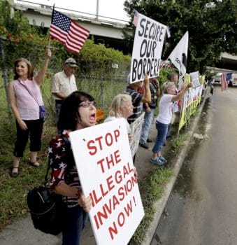 | Barbie Miller left yells as she joins demonstrators outside the Mexican Consulate July 18 2014 in Houston Texas David J Phillip | AP | MR Online