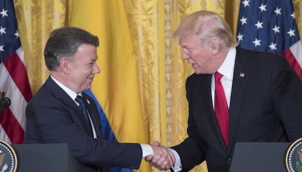 | Colombian President Manuel Santos and US President Donald Trump shake hands Michael Reynolds EPA | MR Online