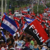 | Sandinistas and followers of President Daniel Ortega wave their Sandinista flags in a march for peace in Managua Nicaragua Saturday | MR Online
