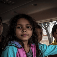 Migrant children traveling with their parents