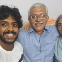 Sagar Abraham-Gonsalves takes a selfie with his parents Vernon Gonsalves and Susan Abraham as the police finished a raid on their home in Mumbai on Tuesday. Minutes later, Vernon Gonsalves was arrested. | Sagar Abraham-Gonsalves
