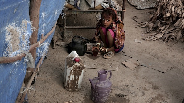 | In this Feb 15 2018 photo Awsaf a thin 5 year old who is getting no more than 800 calories a day from bread and tea half the normal amount for a girl her age drinks tea in Abyan Yemen Nariman El Mofty | AP | MR Online