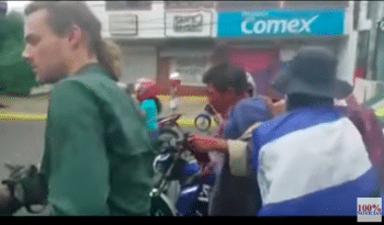 | Goette Luciak left appears briefly in a video photographing an opposition mob as it kidnaps and beats a man it mistook for a Sandinista paramilitary member He has not published photos of the abuse or reported on it Screenshot | YouTube | MR Online