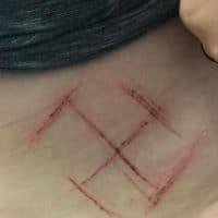 Bolsanaro supporters carve swastika into woman