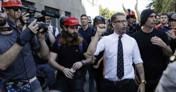 | Proud Boys co founder Gavin McInnes is surrounded by supporters at a rally in Berkeley Calif Photo Marcio Jose Sanchez AP | MR Online