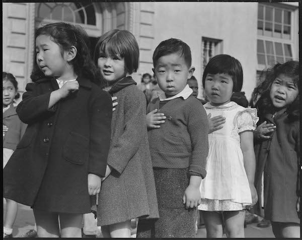 | Header photo School children reciting the Pledge of Allegiance shortly before the military round up of Japanese Americans on the West Coast April 20 1942 Original caption San Francisco California Many children of Japanese ancestry attended Raphael Weill public School Geary and Buchanan Streets prior to evacuation This scene shows first graders during flag pledge ceremony Evacuees of Japanese ancestry will be housed in War Relocation Authority centers for the duration Provision will be effected for the continuance of education Photo by Dorothea Lange courtesy of the National Archives and Records Administration | MR Online