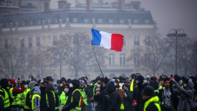 | Demonstrators gather near the Arc de Triomphe in Paris during a protest on Saturday | MR Online