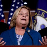Rep. Ileana Ros-Lehtinen, R-Fla., flanked by Rep. Peter King, R-N.Y., left, and Rep. Fred Upton, R-Mich., during a news conference on Capitol Hill in Washington, Nov. 9, 2017. J. Scott Applewhite | AP