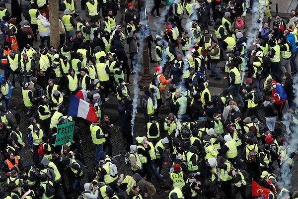 | Tear gas mass arrests as new yellow vest protests hit Paris | ABS ABS CBN News | MR Online