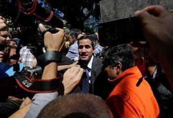 | Juan Guaido speaks to the press as he leaves a public plaza where he spoke in Caracas Venezuela Jan 25 2019 Fernando Llano | AP | MR Online