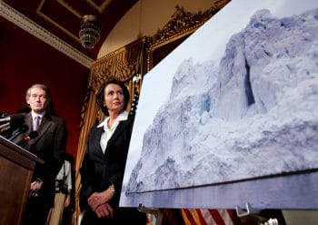 | House Speaker Nancy Pelosi looks at a photo of an iceberg during a news conference on Capitol Hill in Washington June 1 2007 to discuss global warming Susan Walsh | AP | MR Online