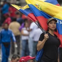 Venezuela in Uproar - The Paris Globalist The Paris Globalist A woman protests in Caracas in October 2016. [Eneas de Troya:Flickr]