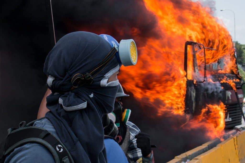 | Demonstrators set a truck on fire in Caracas Venezuela February 18 2018 | MR Online