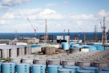 | Tanks carrying nuclear contaminated water behind them are reactors No 1 and 2 | MR Online