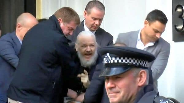 | Julian Assange Outside the Gate of Hell | MR Online
