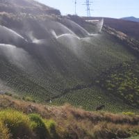Sprinkler irrigation in steep field