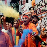 BJP supporters celebrate landslide victory. Photo- Reuters