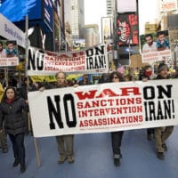 Feb. 4, 2012: International Day of Action: NO U.S. War on Iran. Actrivists rally in Times Square, NYC and march to UN and Israeli Embassy to protest war mongering against Iran, sanctions and drone strikes.