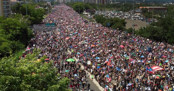 | An aerial view shows thousands of people as they fill the Expreso Las Américas highway calling for the ouster of Gov Ricardo A Rosselló on July 22 2019 in San Juan Puerto Rico Photo Joe RaedleGetty Images | MR Online