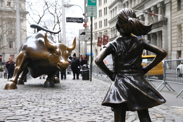 | The Fearless Girl statue looks up the iconic Wall Street Charging Bull sculpture in New York on March 29 2018 Volkan FuruncuAnadolu AgencyGetty Images | MR Online