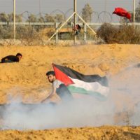 Israeli forces fire tear gas at Palestinian demonstrators during weekly protests