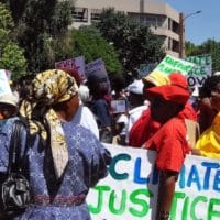 COP17 protest Johannesburg, 2011. Image credit Meraj Chhaya via Flickr.