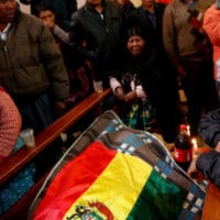 Relatives mourn over the body of Antonio Quispe, killed by security forces, during a funeral at the San Francisco de Asis church in El Alto, outskirts of La Paz, Bolivia, Nov. 20, 2019. Natacha Pisarenko | AP