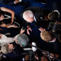 Sen. Bernie Sanders, I-Vt., center right, talks to the media in the spin room following the Democratic presidential primary debate hosted by ABC on the campus of Texas Southern University Thursday, Sept. 12, 2019, in Houston. (AP Photo/Eric Gay)