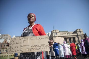 | Emma Tshabangu holds up a sign as members of the United Domestic Workers of South Africa UDWOSA begin gathering for their protest march at Church Square in Pretoria | MR Online