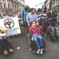 Disabled individuals protesting