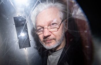 | Fifty weeks in prison for violating his bail Julian Assange in January 2020 in a police van on the way to Londons maximum security Belmarsh prison Dominic LipinskiPress Association ImagesKeystone | MR Online