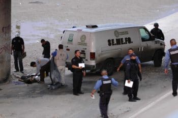| Mexican forensic experts examine the body of 14 year old Sergio Hernandez under the Paso Del Norte border bridge in Ciudad Juarez Mexico Photo | AP | MR Online