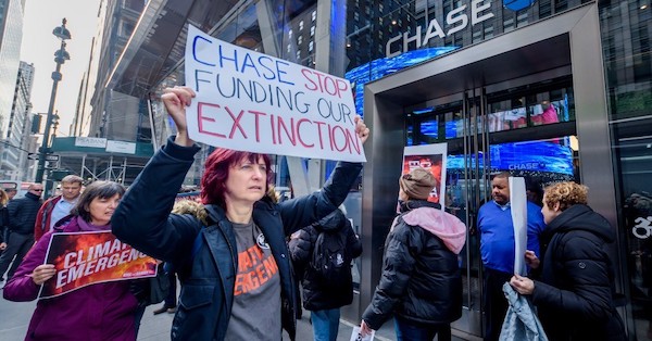 | Protesters picket outside a Chase Bank branch in November 2019 An Extinction Rebellion campaigner released a leaked document from the bank Thursday in which JP Morgan Chase economists warned the companys investment in fossil fuels is contributing to the climate crisis Photo Erik McGregorLightRocket via Getty Images | MR Online