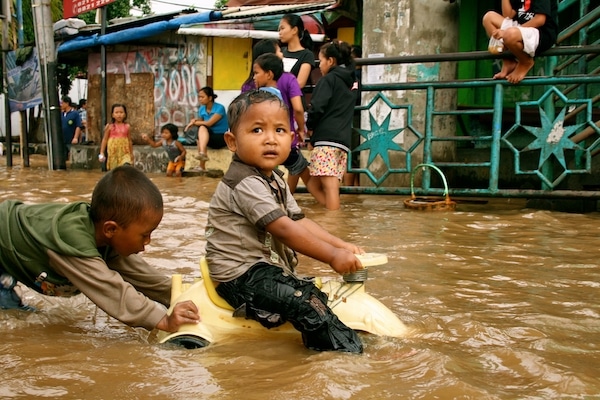 | Children playing in flood water | MR Online