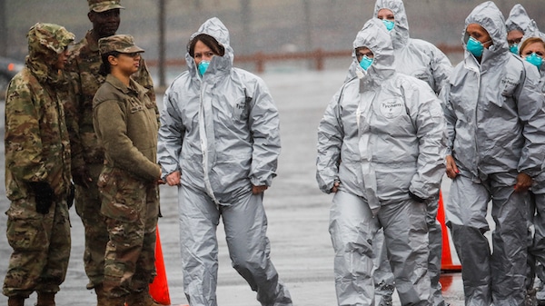 | Medical personnel arrive to perform COVID 19 coronavirus infection testing procedures at Glen Island Park Friday March 13 2020 in New Rochelle NY AP PhotoJohn Minchillo | MR Online